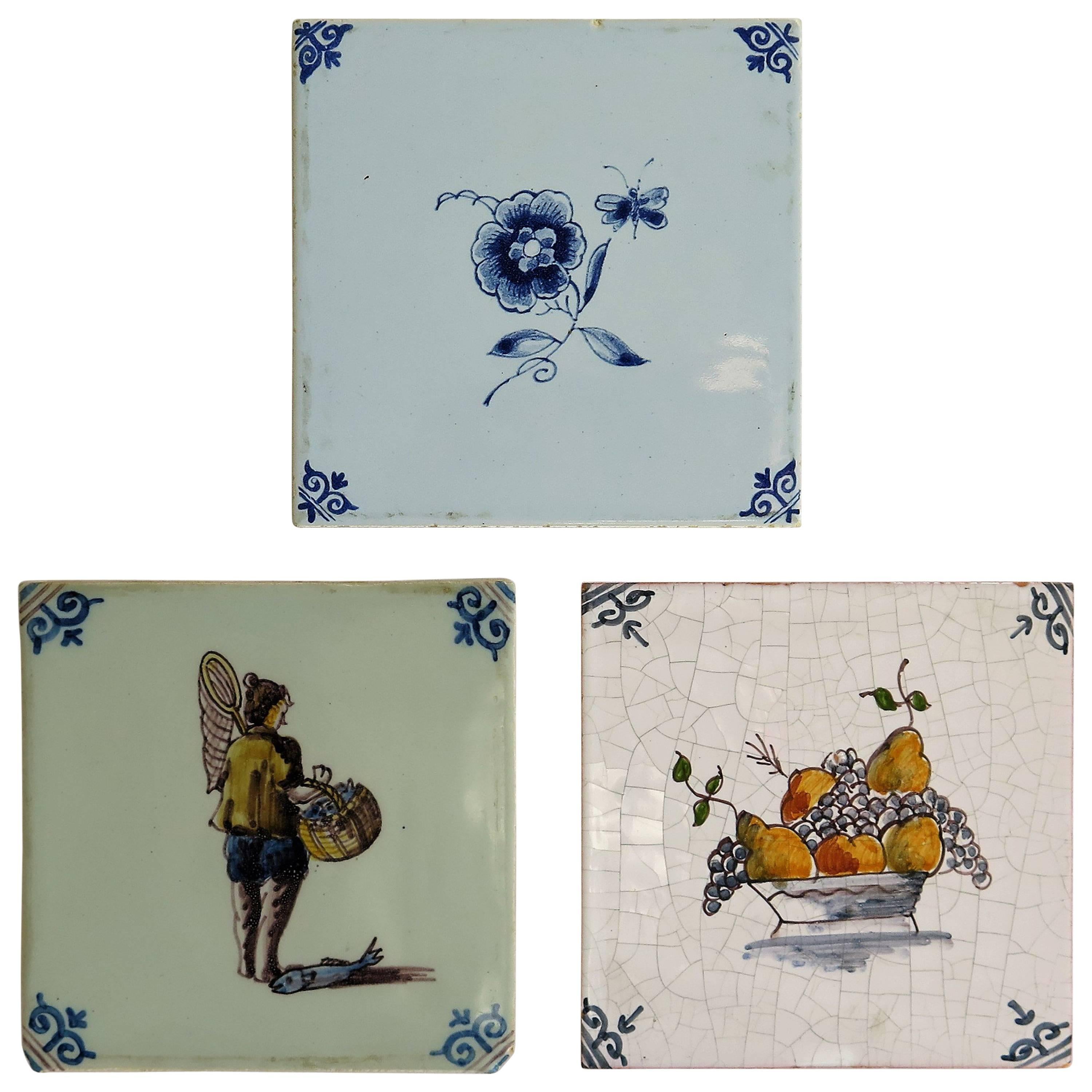 Three Ceramic Delft Wall Tiles Fisherman Fruit Bowl and Flowers, Two 19th C 