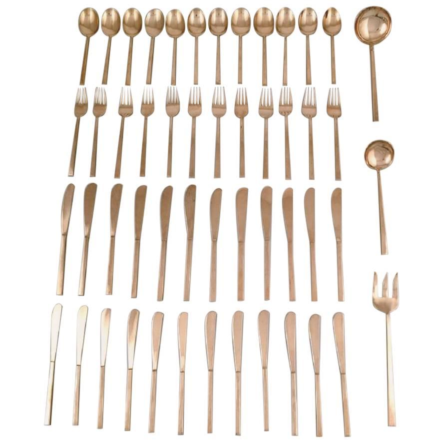 Sigvard Bernadotte 'Scanline' Cutlery of Brass Complete for 12 Persons