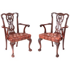 Fine Pair of Antique Carved Mahogany Claw and Ball Elbow or Desk Chairs