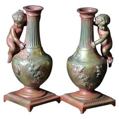 18th Century Pair of Bronze Vases with Cherubs