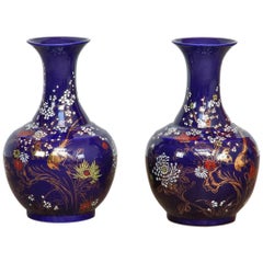 Pair of Chinese Cobalt Blue Flora and Fauna Trumpet Vases