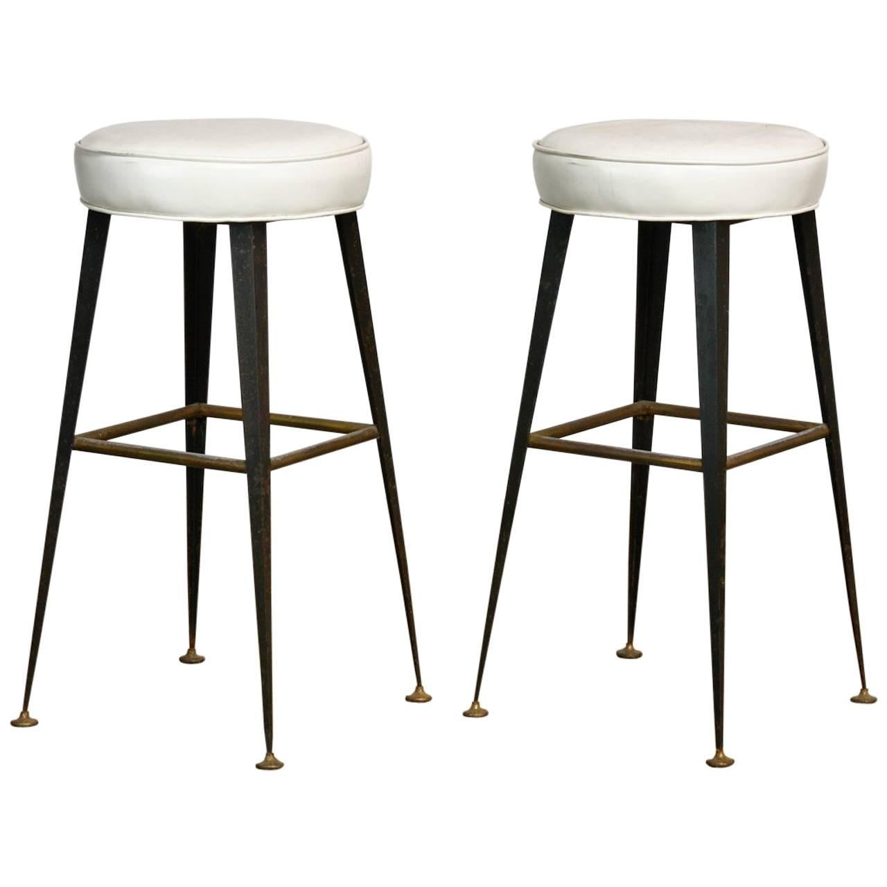 Pair of Midcentury Industrial Iron and Vinyl Barstools