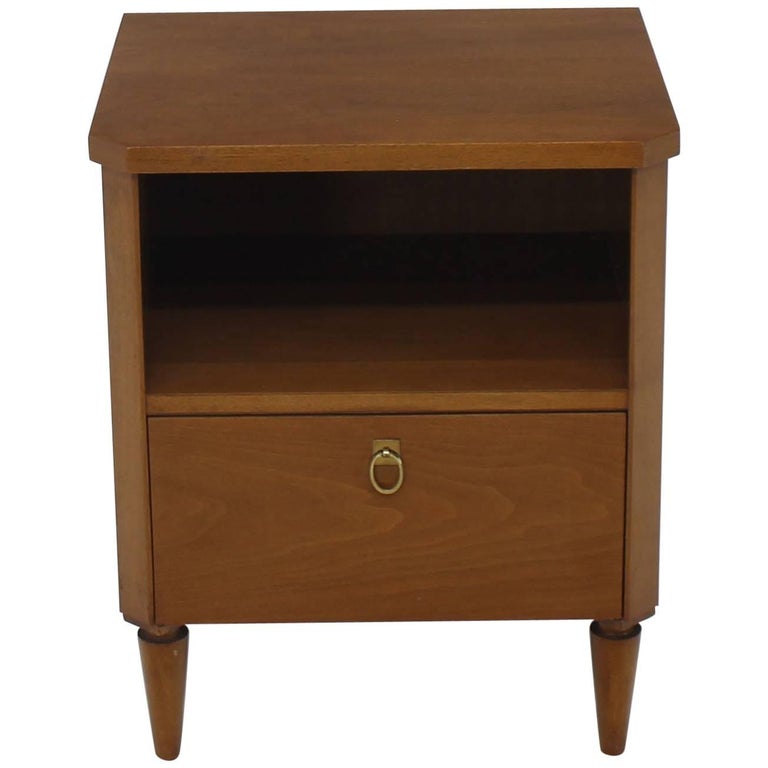 Single Mid-Century Modern walnut Stand with one drawer and a brass pull by Widdicomb.