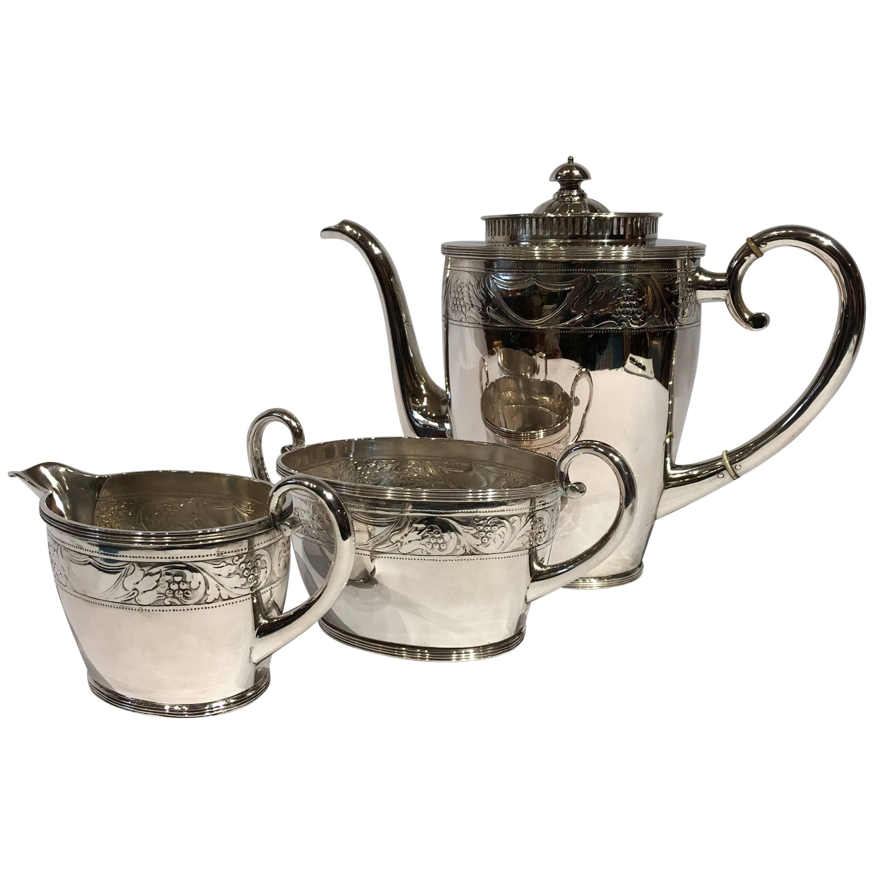 Coffee Set of Coffee Jug, Sugar Bowl, Cream Jug with Chasings, Hallmarked Silver For Sale