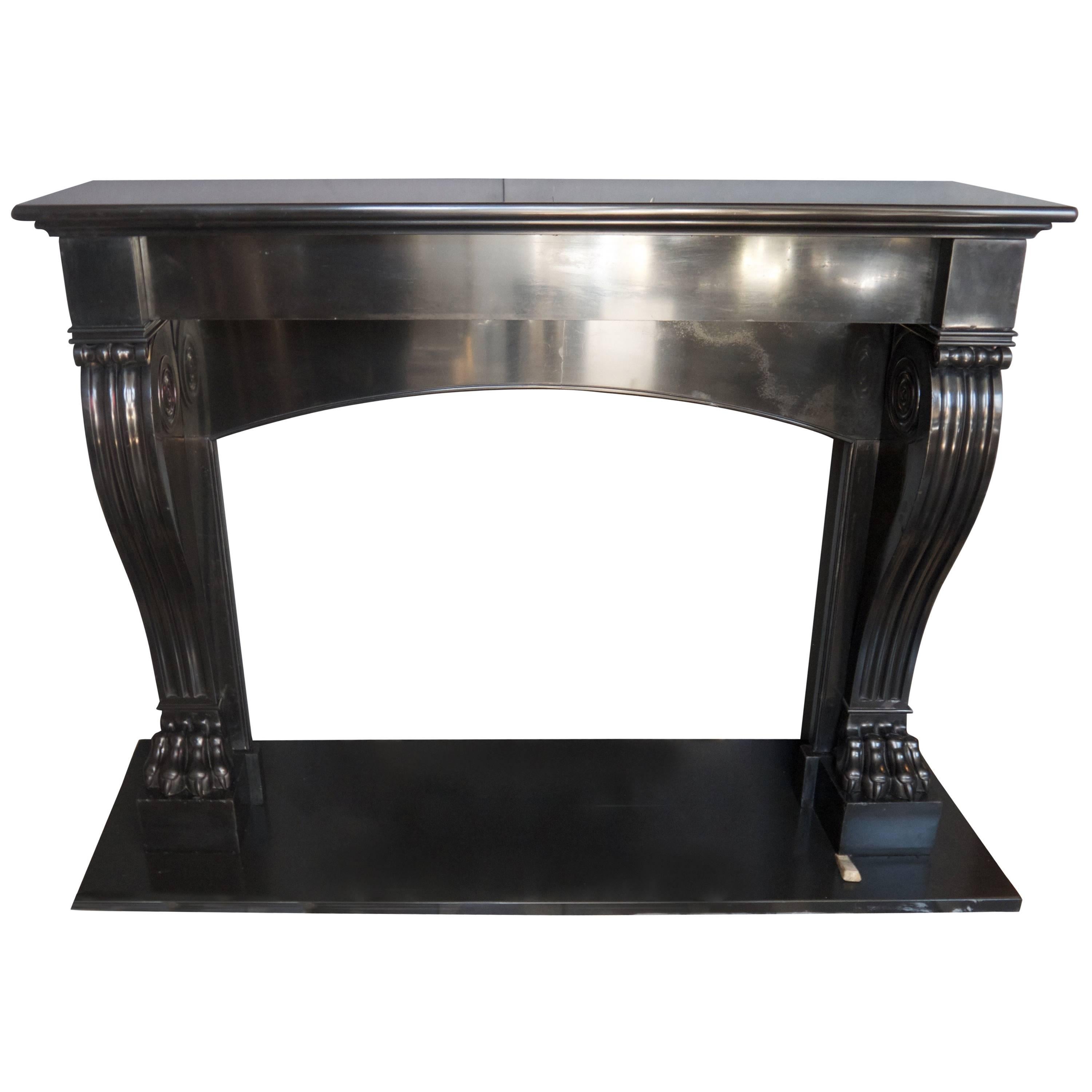 Antique Black Belgian French Fireplace mantle piece with an arched lintle.   For Sale