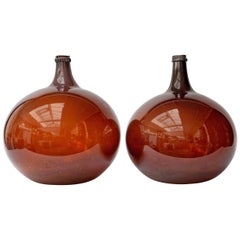 Antique Set of Two 19th Century Large Blown Demijohn Amber Colored Glass Bottles