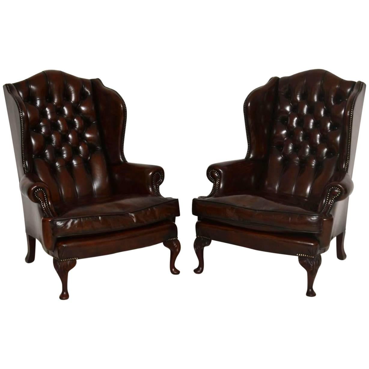 Pair of Antique Leather Wing Back Armchairs