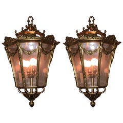 Pair of Antique Bronze and Glass Lanterns in the French Taste