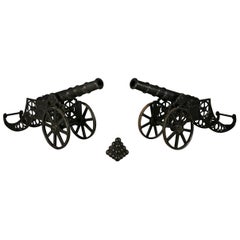 Pair of 20th Century Cast Iron Feature Cannons with Stack of Balls