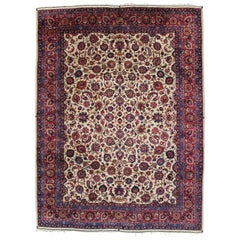 Vintage Persian Mashhad Rug with Traditional Style