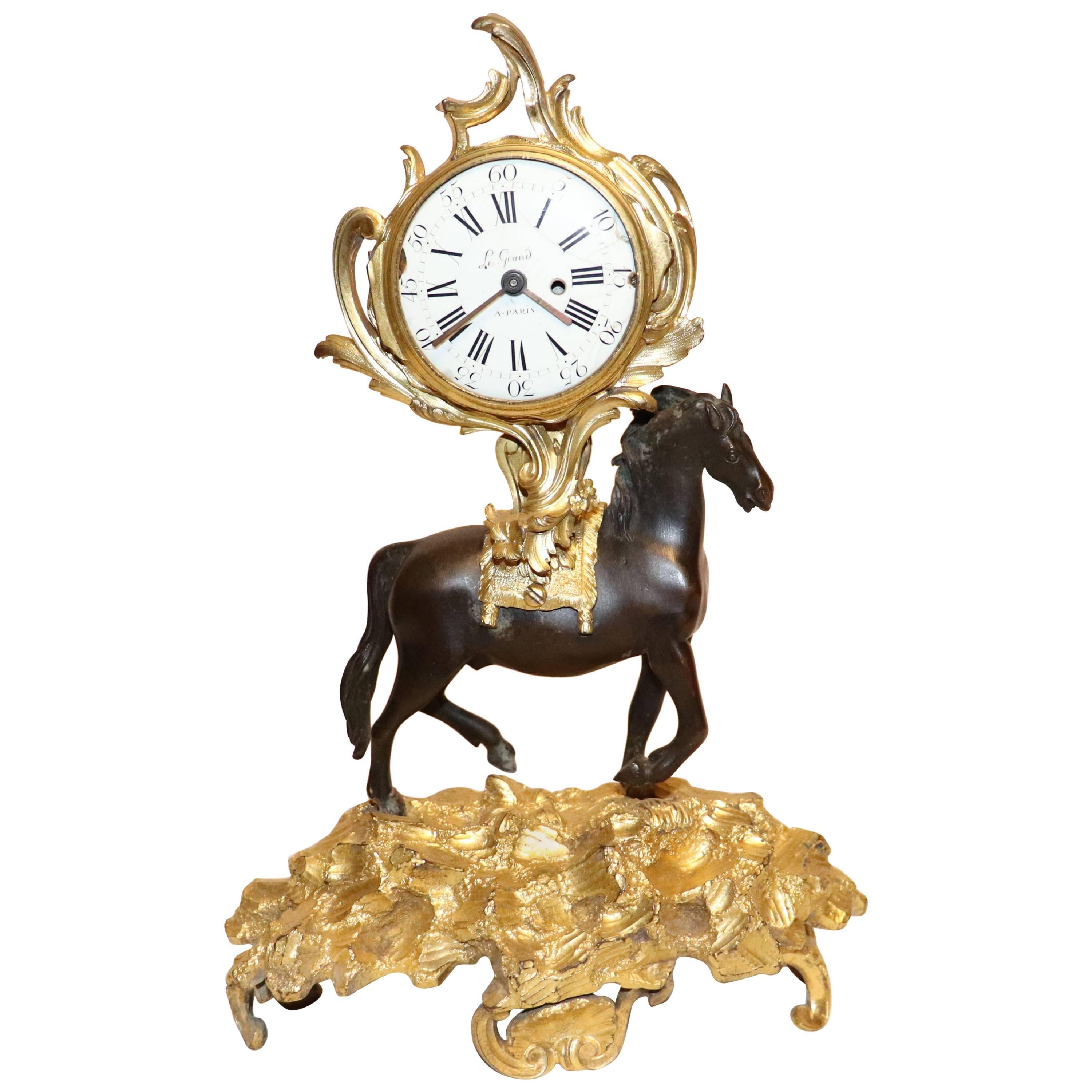 Rococo Gilt Bronze Clock with a Patinated Horse For Sale