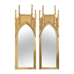Coppia di specchi architettonici inglesi in legno dorato alti circa 9 piedi