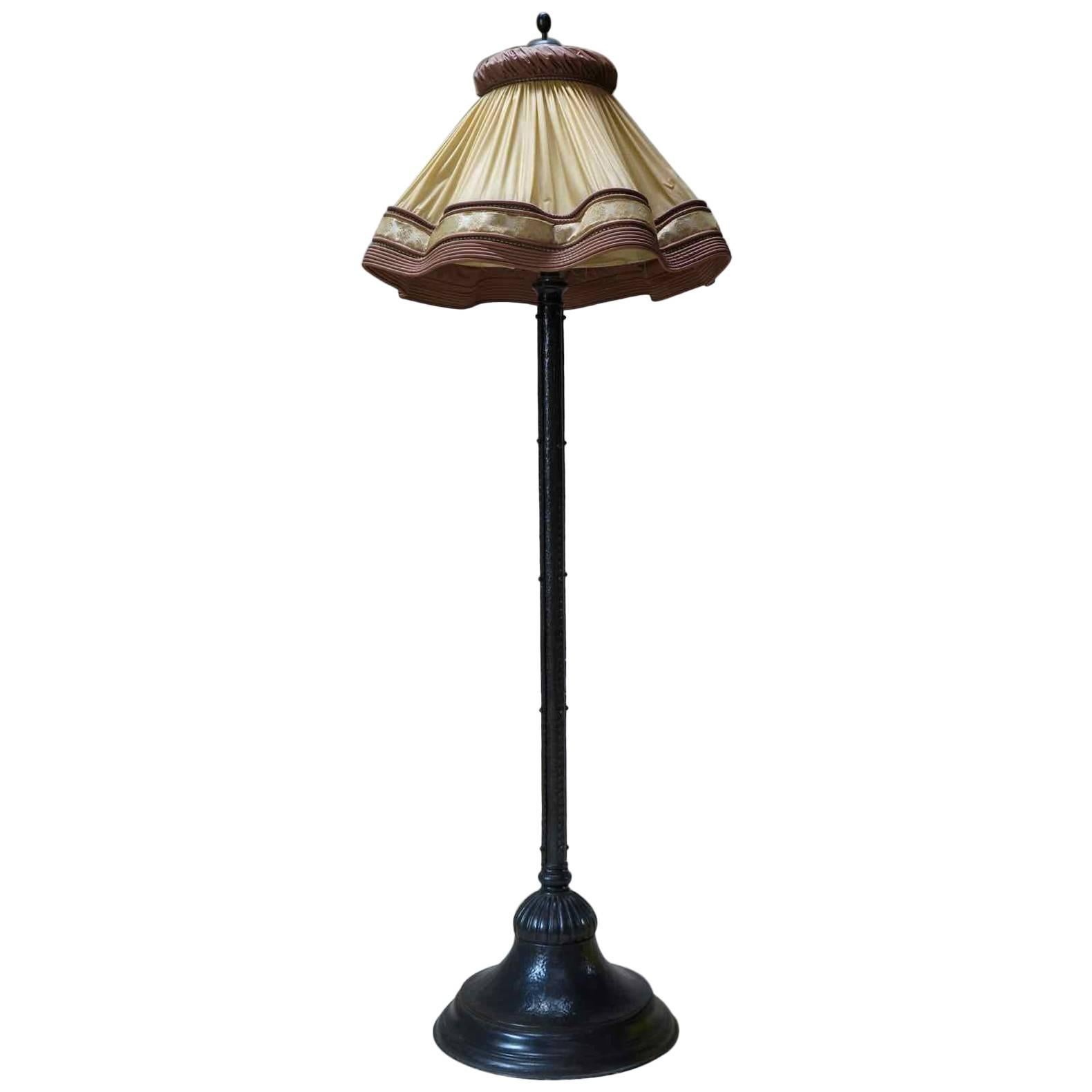1930s Hammered Iron Floor Lamp with Large Plastic Shade For Sale