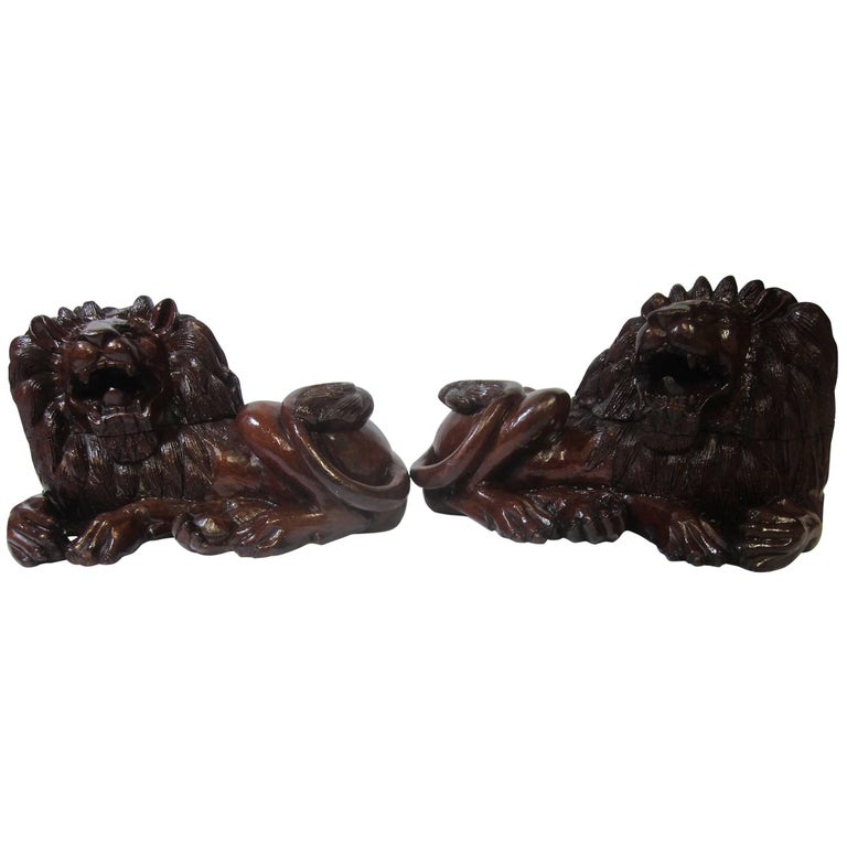 Pair of Carved Hard Wood African Lions For Sale at 1stDibs