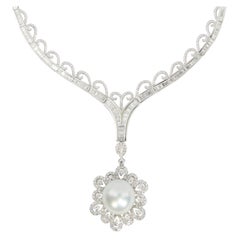 Très grand pendentif en perles des mers du Sud avec collier en or 18 carats et diamants