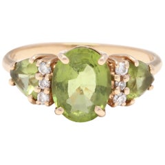 14K Yellow Gold, Peridot 
Diamond Three Stone Ring, August Birthstone