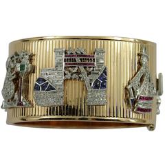 Mid-Century Gold Cuff Bracelet with Art Deco Charms