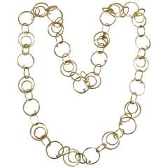  Halskette aus Gelbgold mit Kreisen und schwebenden Diamanten