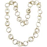 Collana a catena con cerchi e diamanti fluttuanti in oro giallo