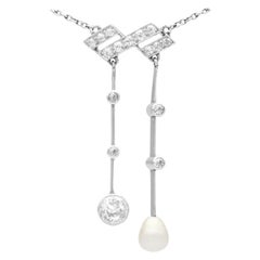 Antique 1900s Pearl and 1.12 Carat Diamond Platinum Necklace