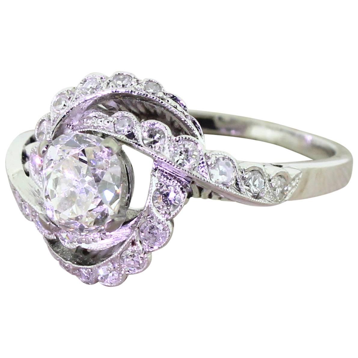 Art Deco 1.21 Carat Old Cut Diamond “Swirl” Platinum Engagement Ring For Sale