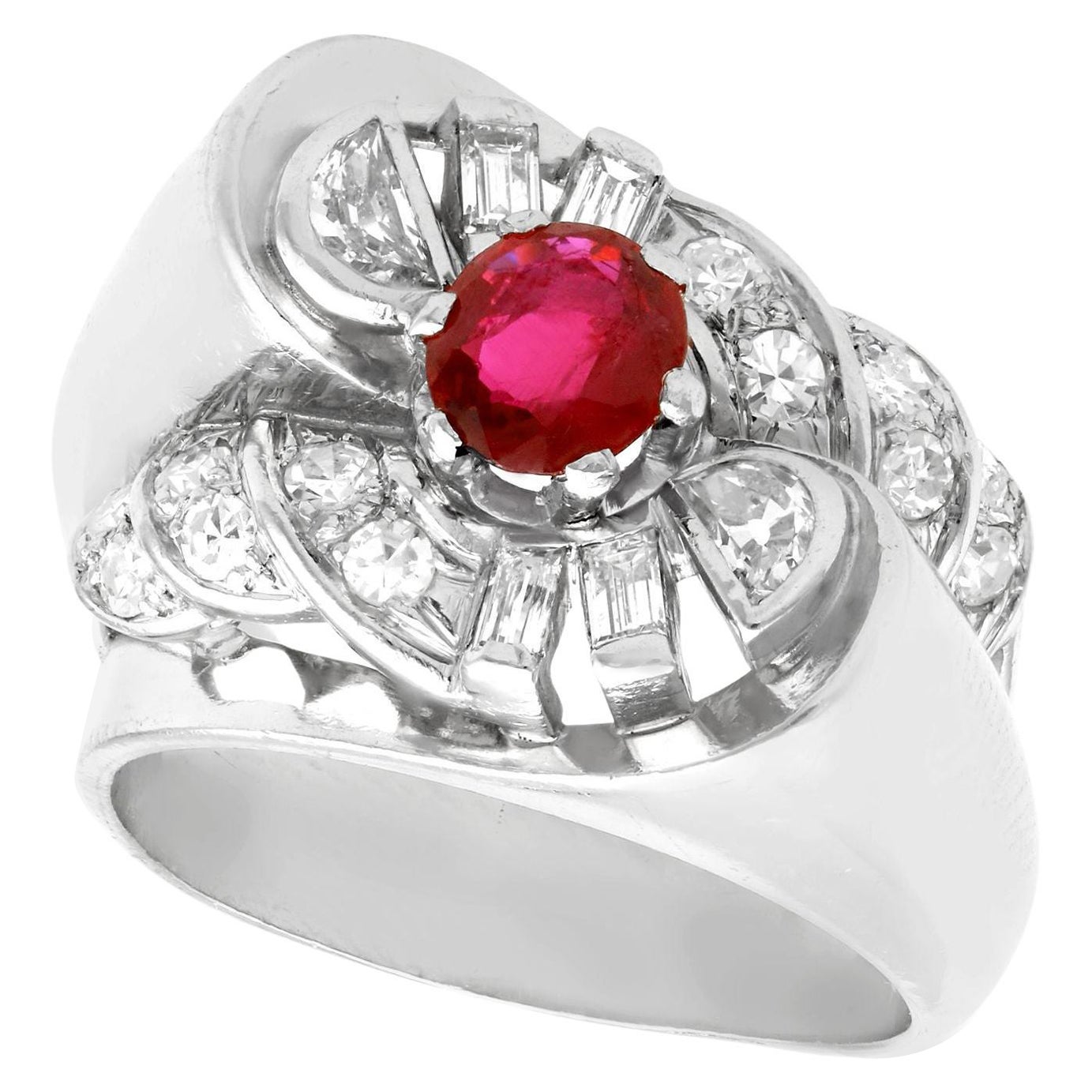 Vintage French 1940s Oval Cut Ruby and Diamond Platinum Cocktail Ring For Sale