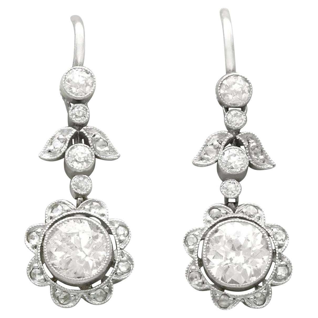 Antique 1.42 Carat Diamond and Platinum Floral Drop Earrings