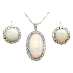 Antique 1920s 8.18 Carat Opal and Diamond Earring and Pendant Set