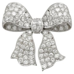 1930s Antique 2.85 Carat Diamond and Platinum Bow Brooch