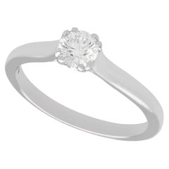 Retro 90s Diamond and Platinum Solitaire Engagement Ring