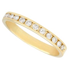 Retro Diamond and Yellow Gold Half Eternity Engagement Ring