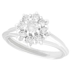 Retro 1960s Diamond and White Gold Cluster Engagement Ring
