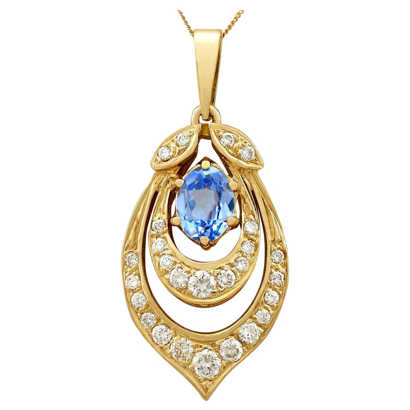 Vintage 1980s 1.10 Carat Oval Cut Aquamarine Diamond Yellow Gold Pendant