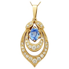 Vintage 1980s 1.10 Carat Oval Cut Aquamarine Diamond Yellow Gold Pendant