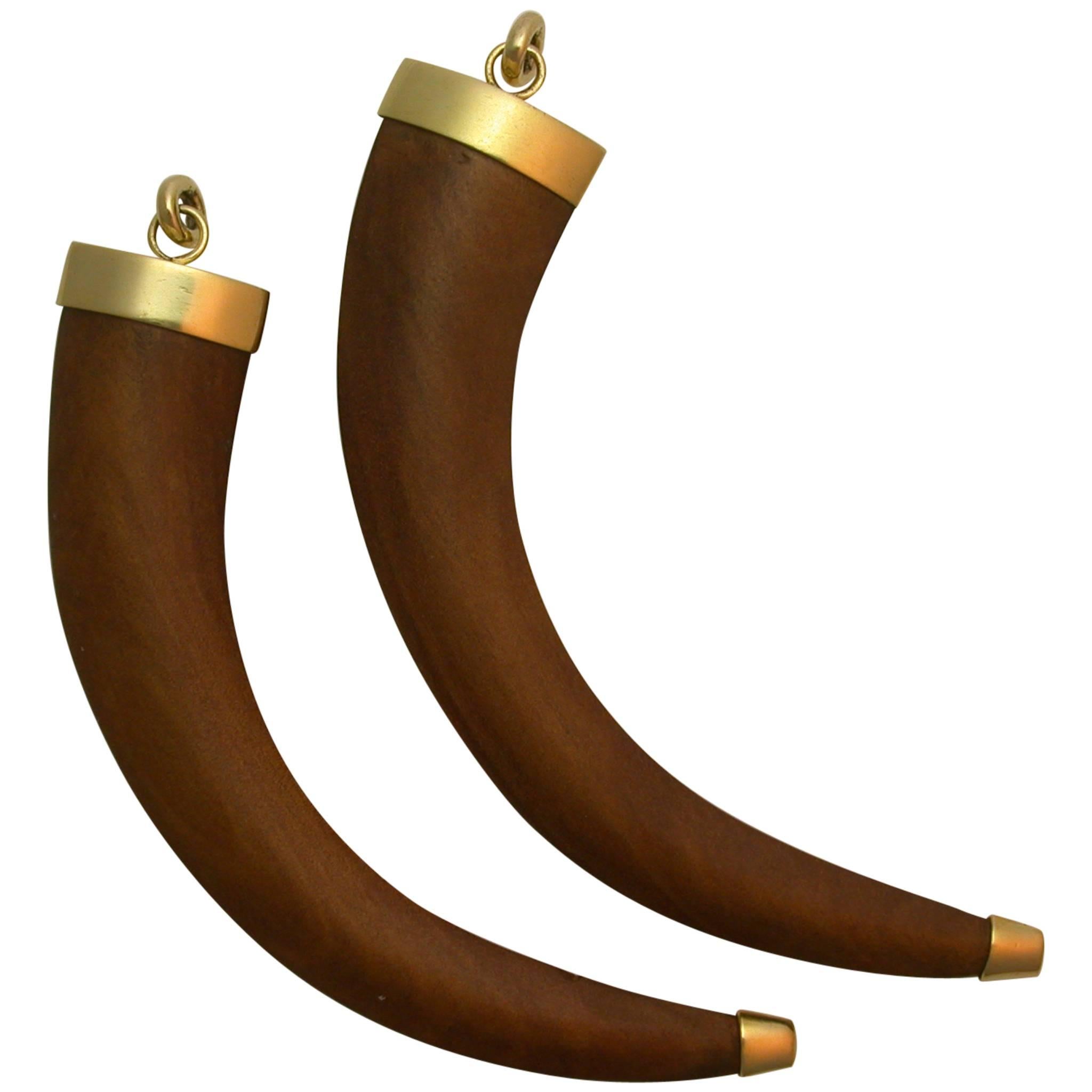 Pair Gold and Wood Tusk Pendants For Sale