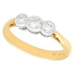 Diamond and Yellow Gold Three-Stone Engagement Ring