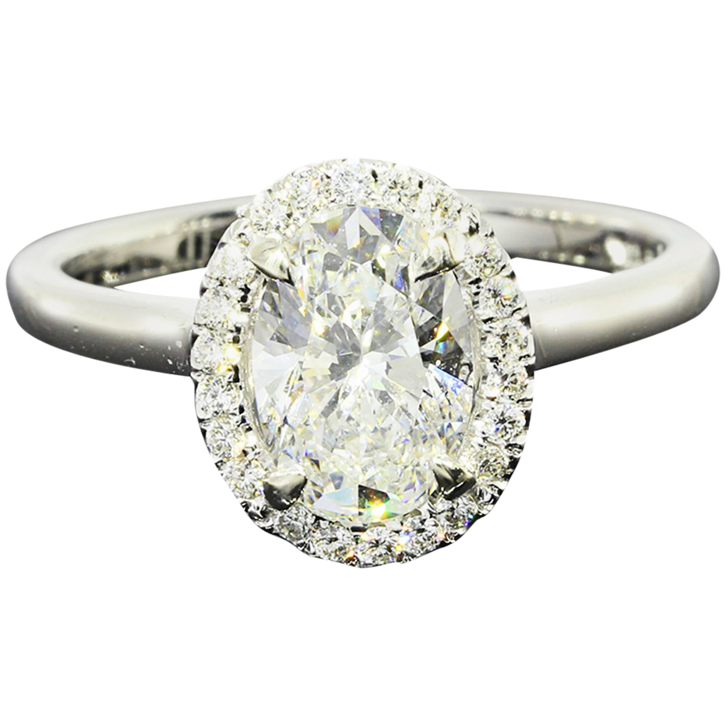 1.41 Carat GIA Cert Oval Diamond Gold Halo Engagement Ring