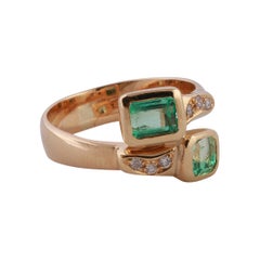 18 Karat Yellow Gold "Vous et Moi" Ring with two Emeralds and Diamonds