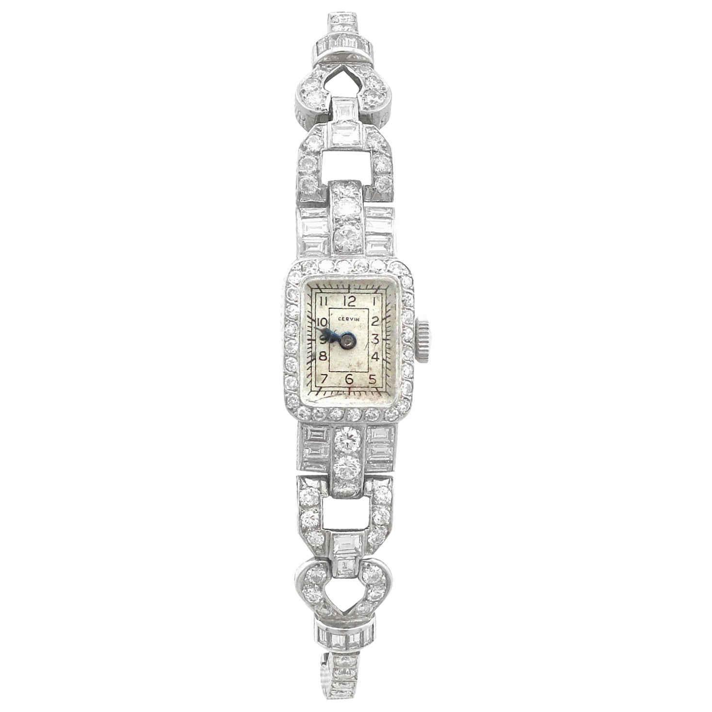 A fine and stunning vintage diamond cocktail watch in platinum, with 3.35 carat (total) diamonds; part of our diverse vintage watch and diamond jewelry collections

This stunning ladies' diamond cocktail watch made by Cervin has been crafted in