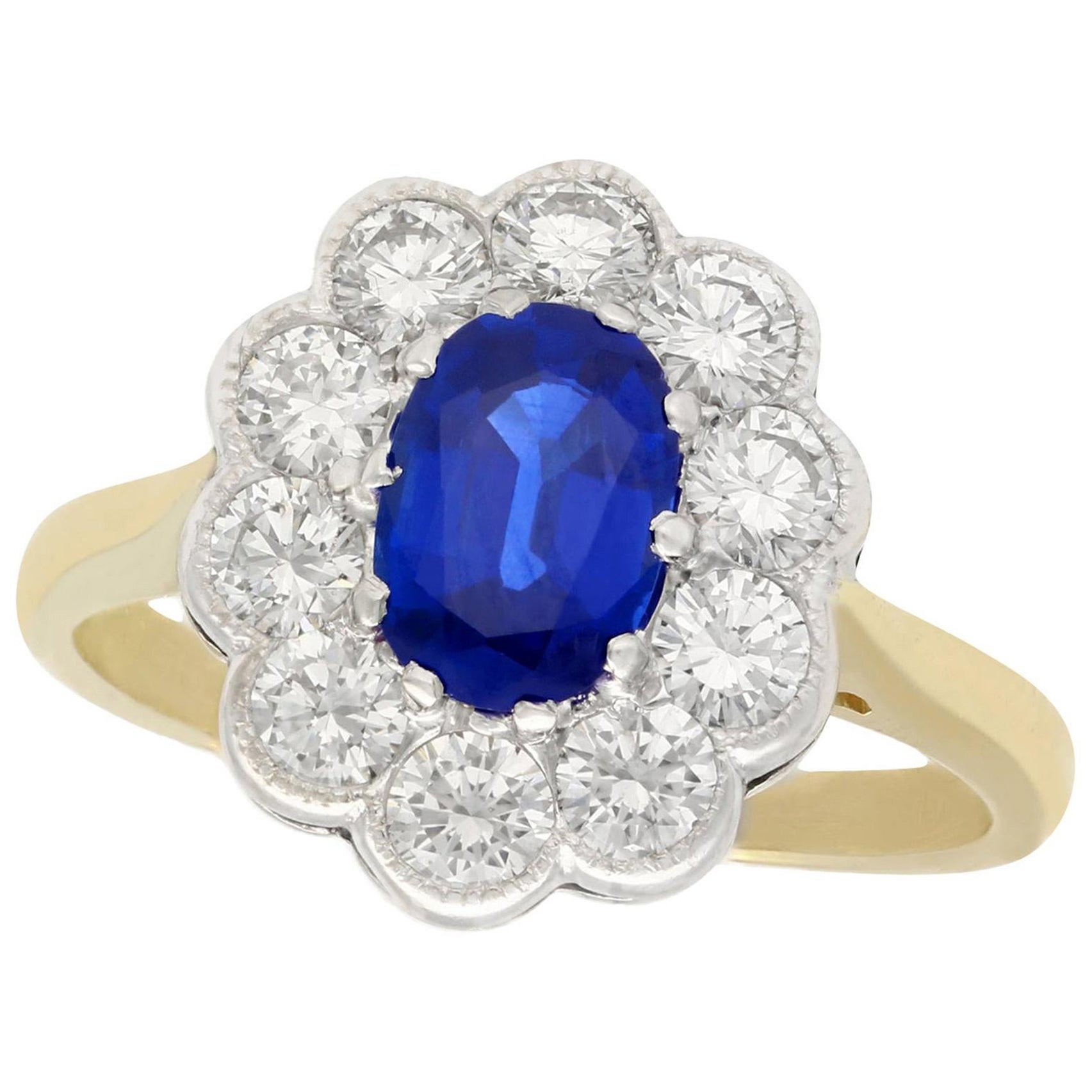 Vintage 1.28 Carat Sapphire and 1.30 Carat Diamond Yellow Gold Cluster Ring For Sale