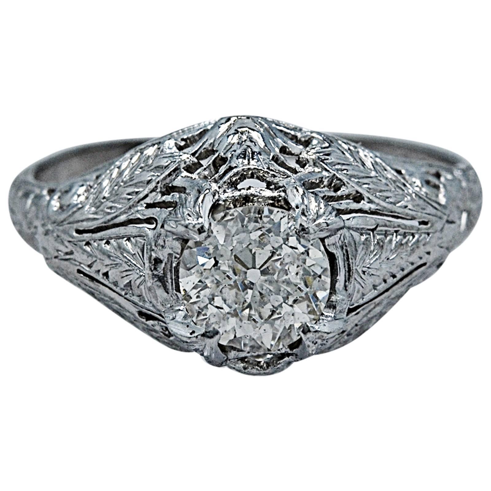 Stunning Art Deco .68 Carat Diamond Platinum Engagement Ring For Sale