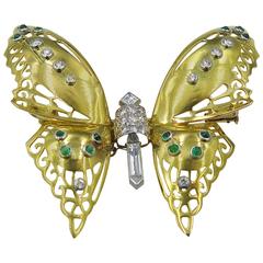 A Beautiful Platinum, Diamond, Emerald and Gold Butterfly Brooch.
