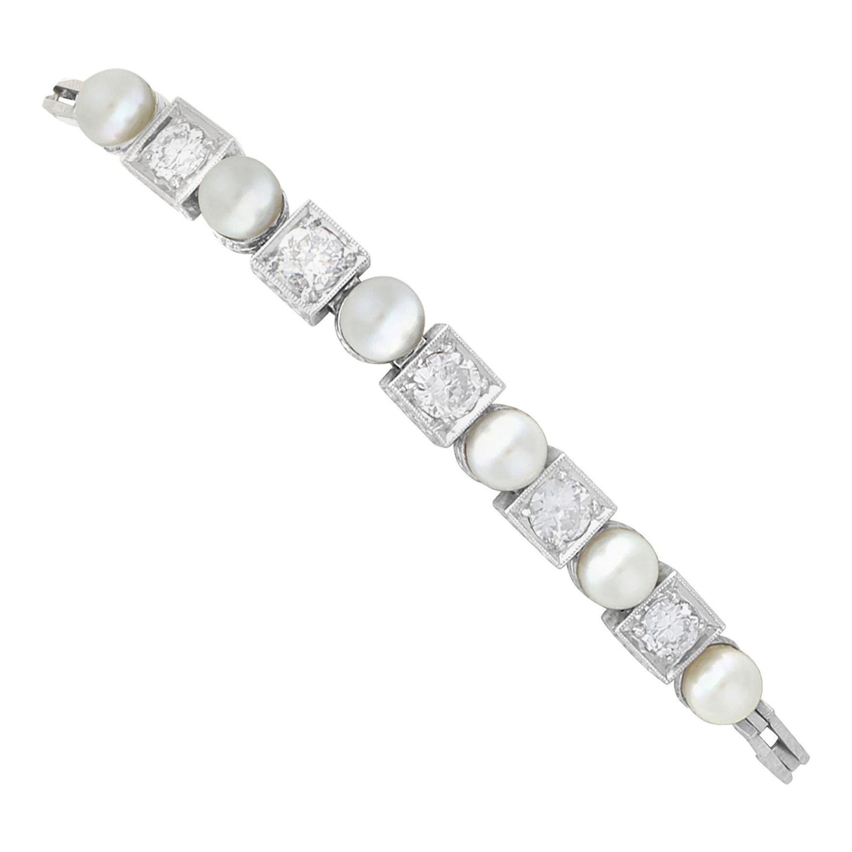 1930s Antique 1.38 Carat Diamond and Cultured Pearl White Gold Bracelet For Sale
