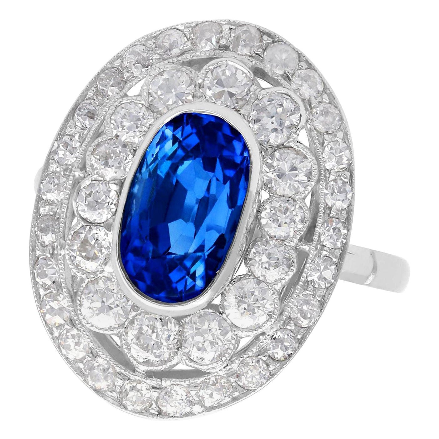 Antique 3.50 Carat Ceylon Sapphire and 2.48 Carat Diamond Platinum Cocktail Ring