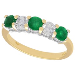 Emerald and Diamond Yellow Gold Engagement Ring