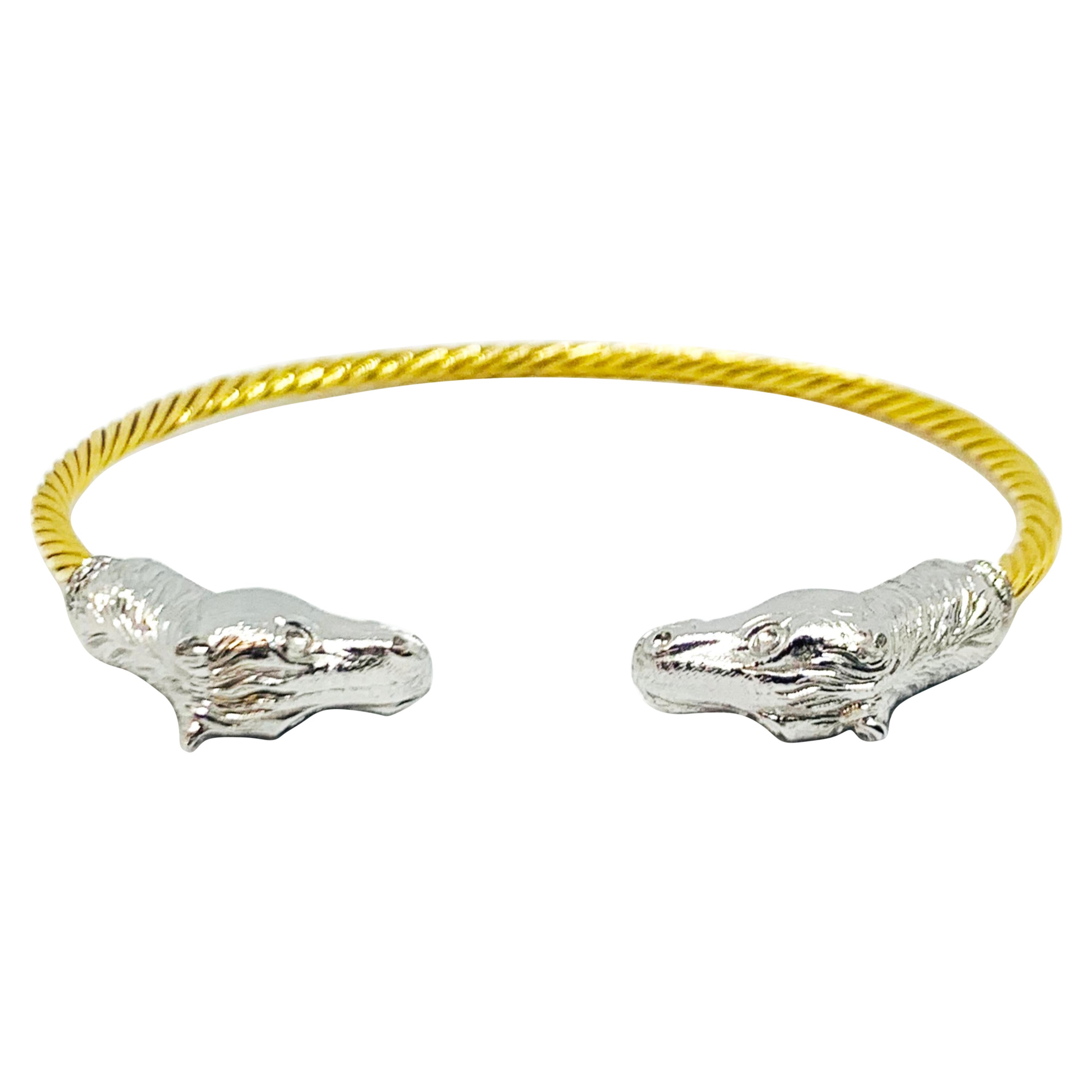 Bracelet jonc contemporain en or blanc et jaune serti de diamants