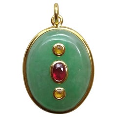 Vintage Jade Oval Cabochon Oval Faceted Ruby Yellow Sapphire 18 Kt Yellow Gold Pendant