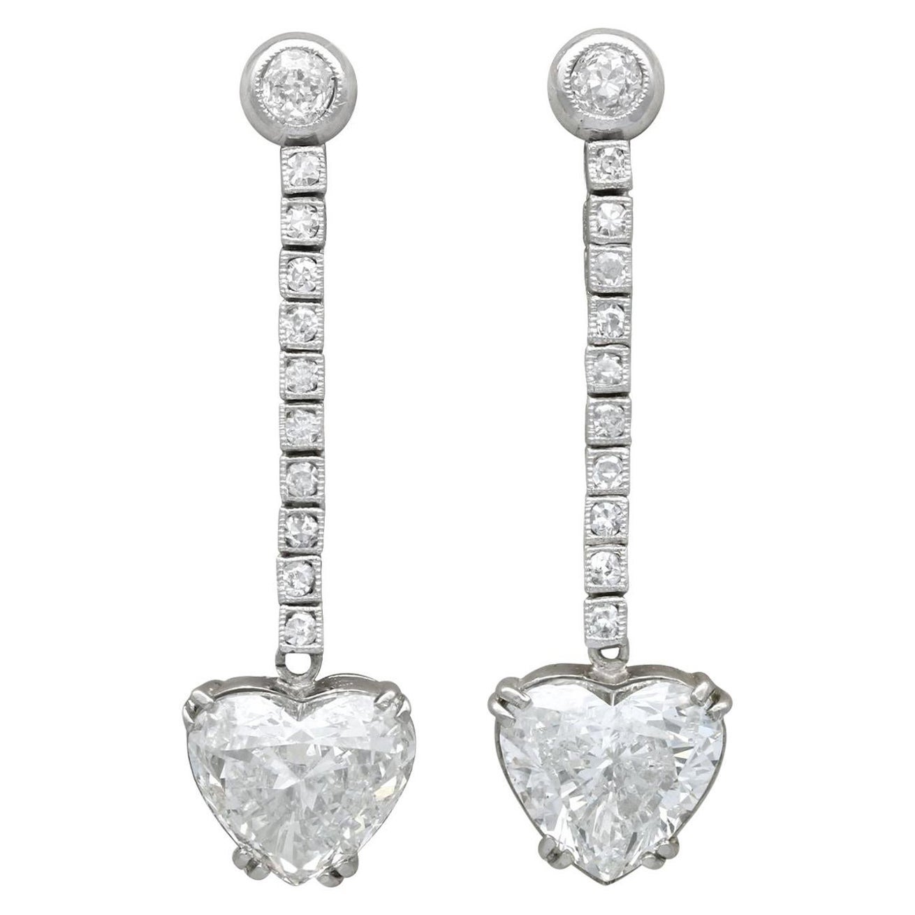 5.35 Carat Diamond and Platinum Earrings For Sale