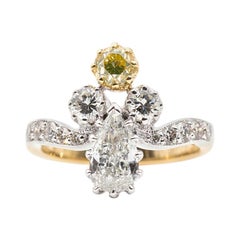 Certified 0.70 Carat Pear and Fancy Yellow Diamond Vintage 18 Carat Gold Ring