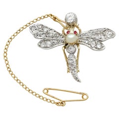 Antique Victorian Diamond Pearl Ruby and Yellow Gold Dragonfly Brooch